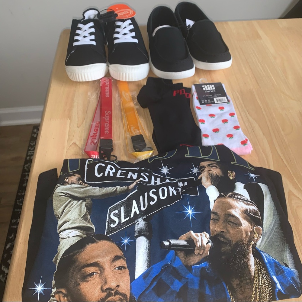Bundle of shoes , socks , and nipsey hussle shirt
